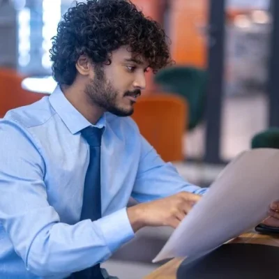 imgi_10_choosing-lunch-dark-haired-young-businessman-checking-menu-choosing-lunch_259150-58645